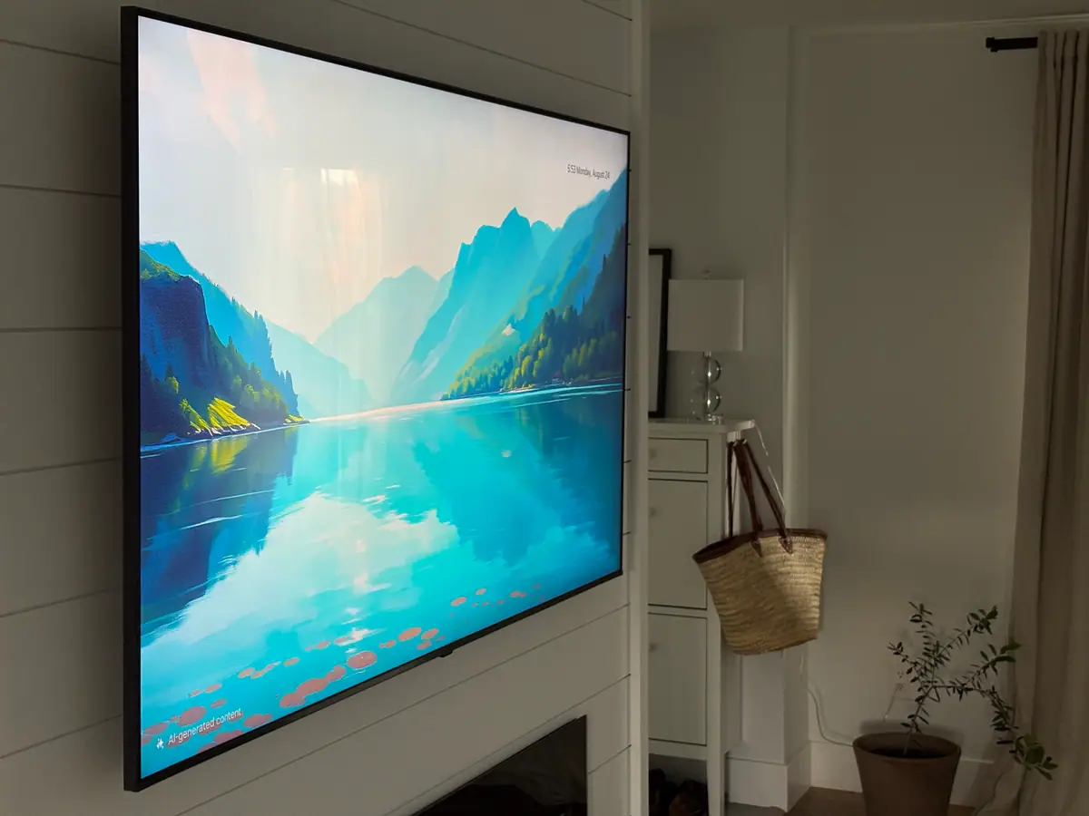 Large television mounted neatly on a feature wall in a Moncton home